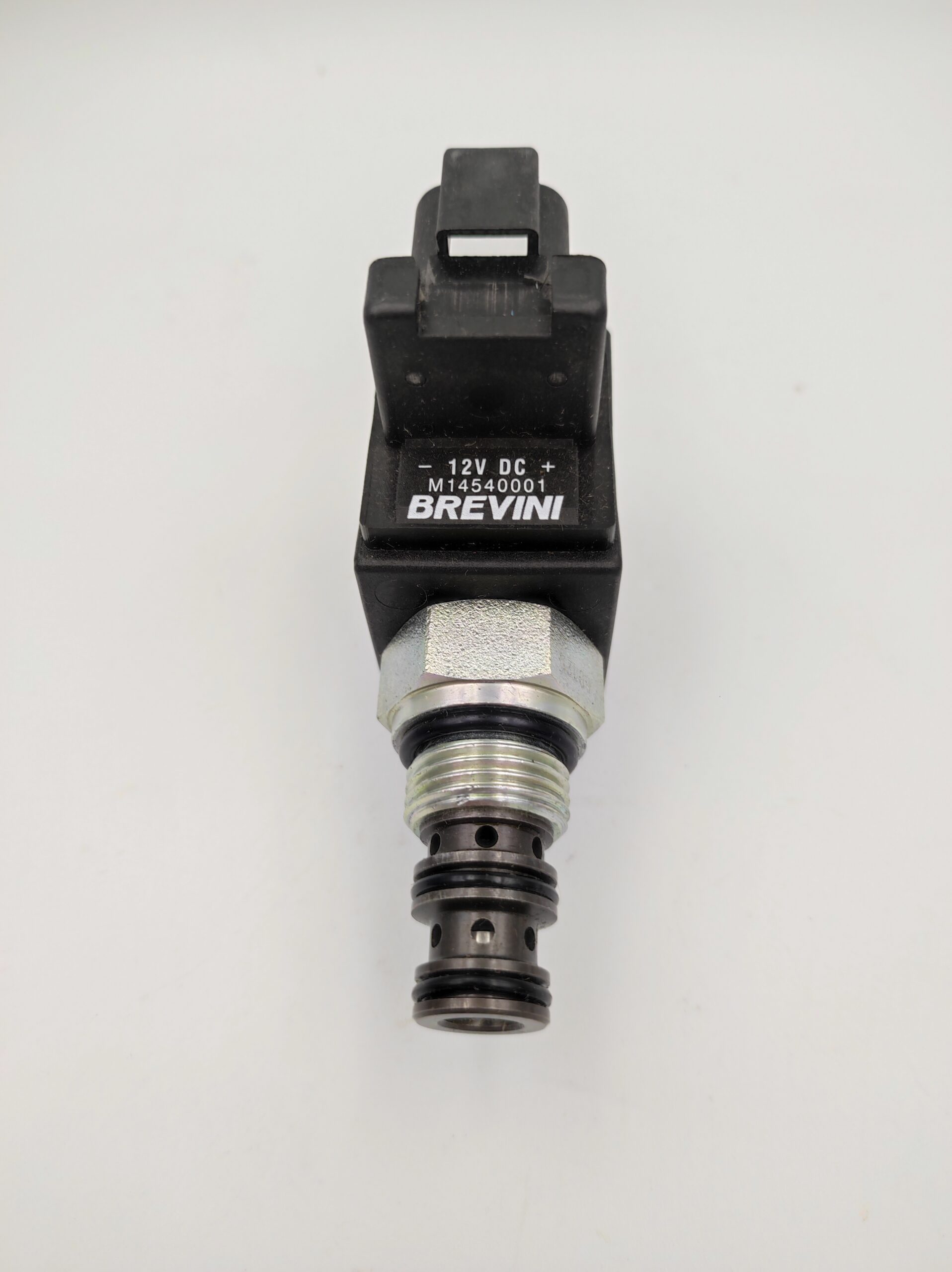 M14540001 Elektrozawór jazdy do przodu w koparko-ładowarce Terex 860 - obrazek 2